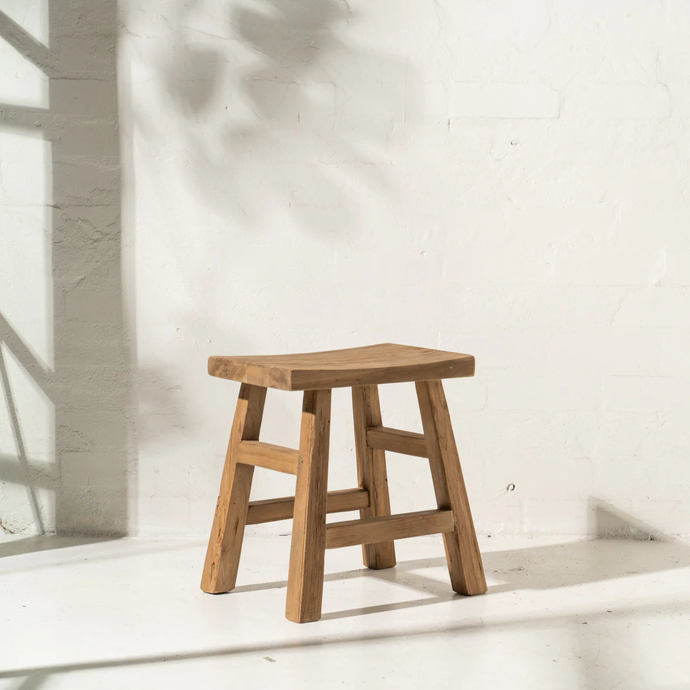 Inartisan Tahana Curved Stool.
